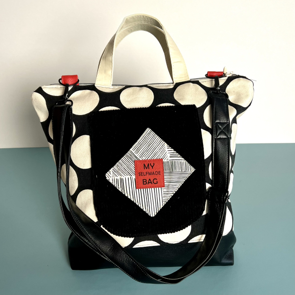 ST10141 robuster Canvas Stoff in schwarz mit großen cremefarbenen Punkten aus 100% Baumwolle Designbeispiel